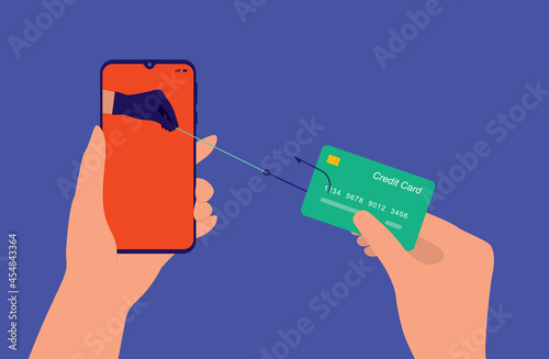 Hacker's Hand With Black Glove Stealing Credit Card Information. Phishing Scam And Cyber Crime Concept.