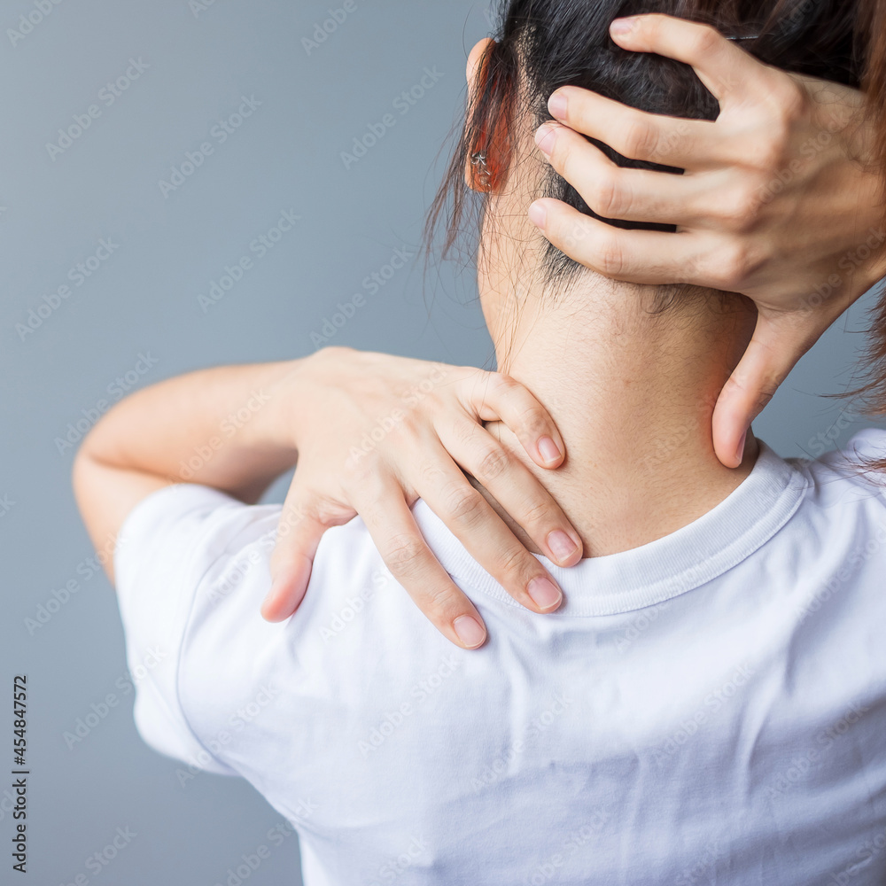woman with her neck sprain, muscle painful during overwork. Girl having