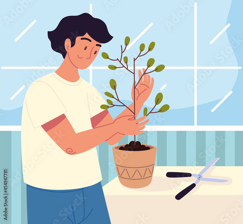 man caring a houseplant
