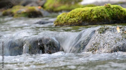 in summer rocky mountain river water silk. mountain river.