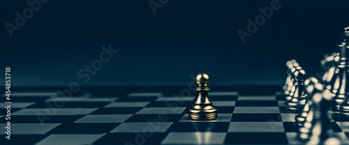 Close-up chess standing first in line teamwork on chess board concepts of business team and leadership strategy and organization risk management or team player.