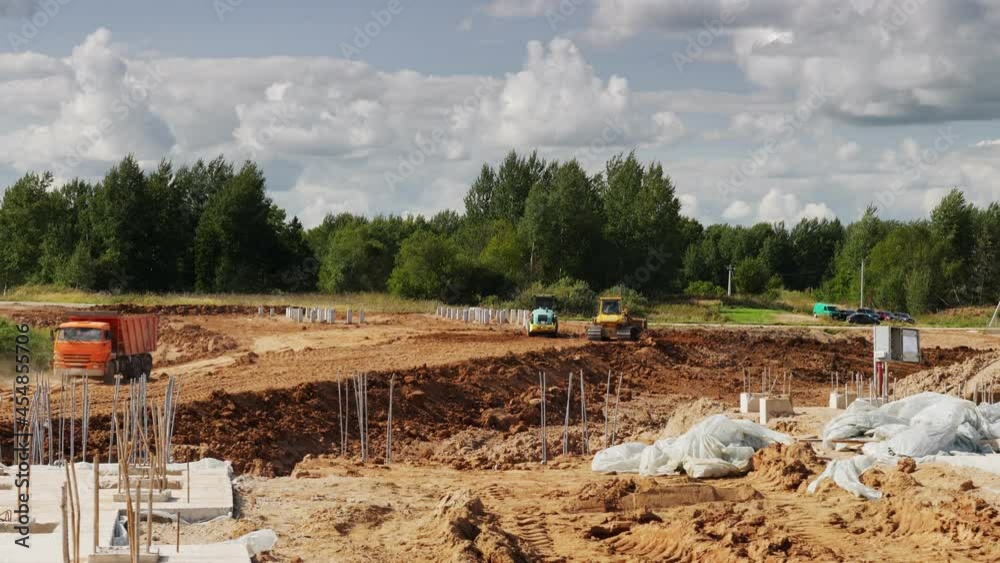 custom made wallpaper toronto digitalVideo shot of тrucks transporting soil for leveling construction site of meat processing plant
