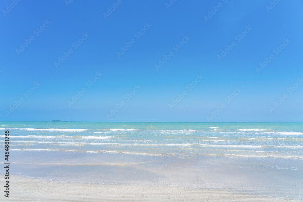 Wave on the sea and blue sky on summer beach for background