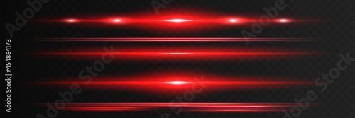 Red horizontal lens flares pack. Laser beams, horizontal light rays.Beautiful light flares. Glowing streaks on dark background. Luminous abstract sparkling lined background.