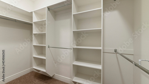 Pano Interior of an empty walk-in closet room with floor vent