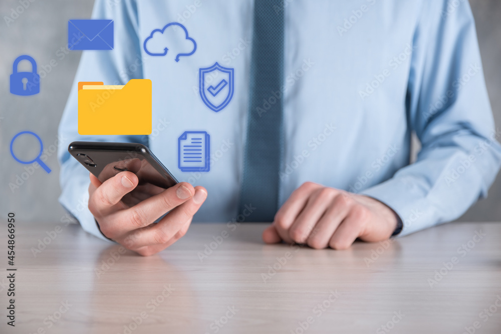 Document Management System DMS .Businessman hold folder and document icon.Software for archiving, searching and managing corporate files and information.Internet Technology Concept.Digital security Document Management System DMS .Businessman hold folder and document icon.Software for archiving, searching and managing corporate files and information.Internet Technology Concept.Digital security