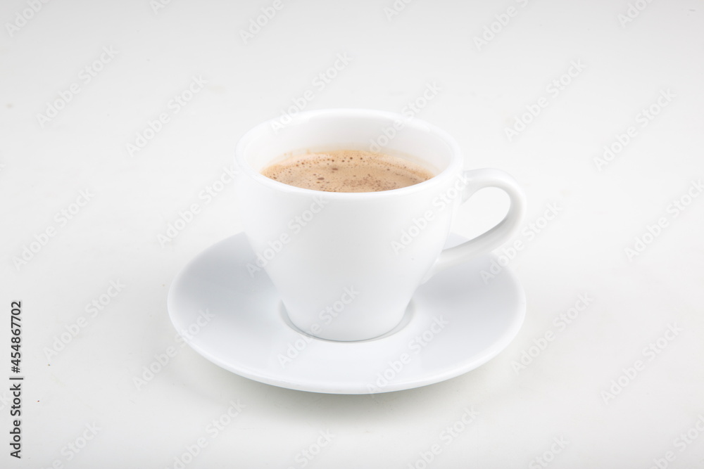 small cup of hot chocolate on a white plate in a white cup small cup of hot chocolate on a white plate in a white cup
