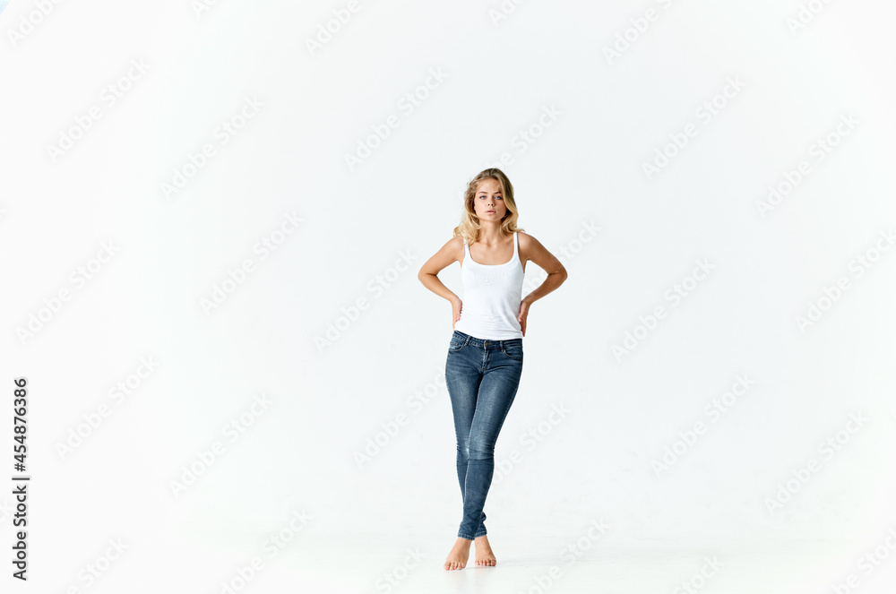 woman in jeans barefoot Positive light motion background woman in jeans barefoot Positive light motion background