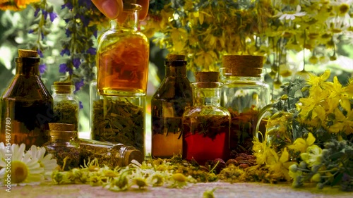 Bottled herbal tincture, homeopathy. Selective focus.