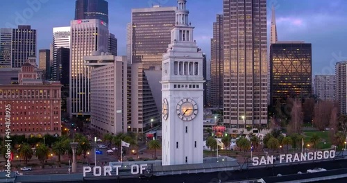 Aerial: Downtown and Ferry Building in Embarcadero, San Francisco, USA photo