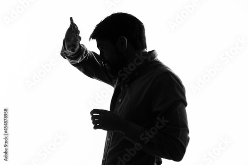 businessmen Secret agent with a gun in the hands of a crime isolated background