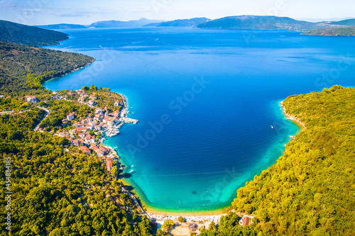 Bay and village of Valun on Cres island aerial view, idyllic beach and nautical destination