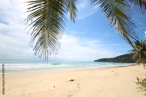 sea ​​view karon beach Phuket Province on a hot day, crystal clear waters, white sandy beaches. © Sirilert