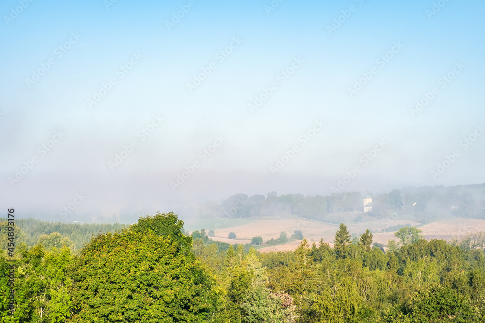 Obraz premium Foggy morning in a countryside landscape