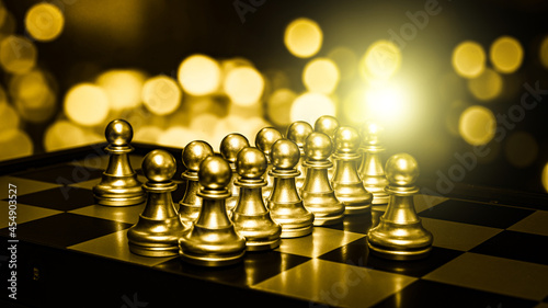 Closeup of chess characters on board games. to represent decision making in term of business strategy to find out the best solution to meet target objective and goal. 