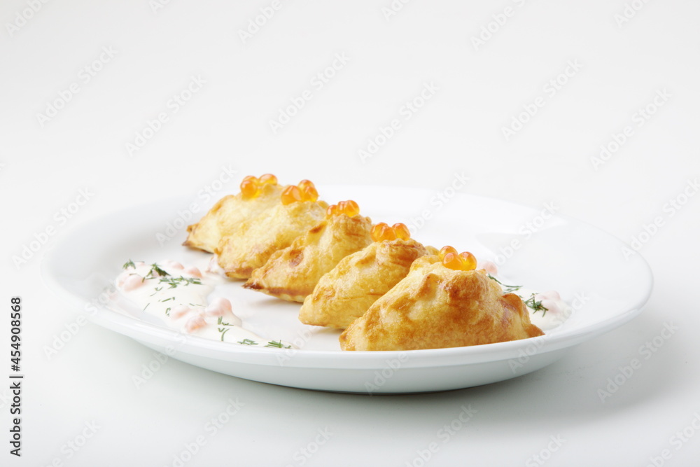Traditional Russian baked pies pirozhki. Isolated over white background