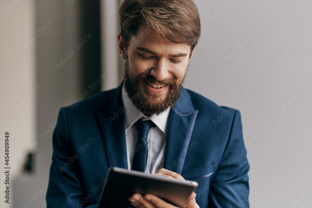man in suit holding a tablet message technology lifestyle man in suit holding a tablet message technology lifestyle