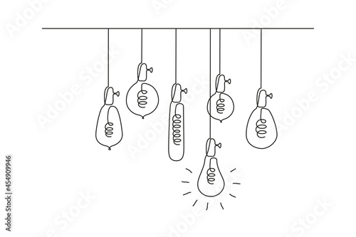 Fototapeta One continuous line drawing of hanging loft light bulbs with one glowing