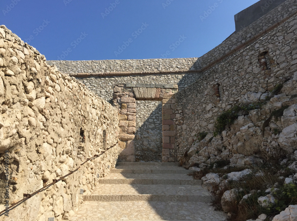 The steps leading towards the entrance to the Château d'If, a fortress and former prison located on the Île d'If, the smallest island in the Frioul archipelago, situated offshore from Marseille. The steps leading towards the entrance to the Château d'If, a fortress and former prison located on the Île d'If, the smallest island in the Frioul archipelago, situated offshore from Marseille.