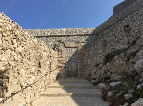 The steps leading towards the entrance to the Château d'If, a fortress and former prison located on the Île d'If, the smallest island in the Frioul archipelago, situated offshore from Marseille.