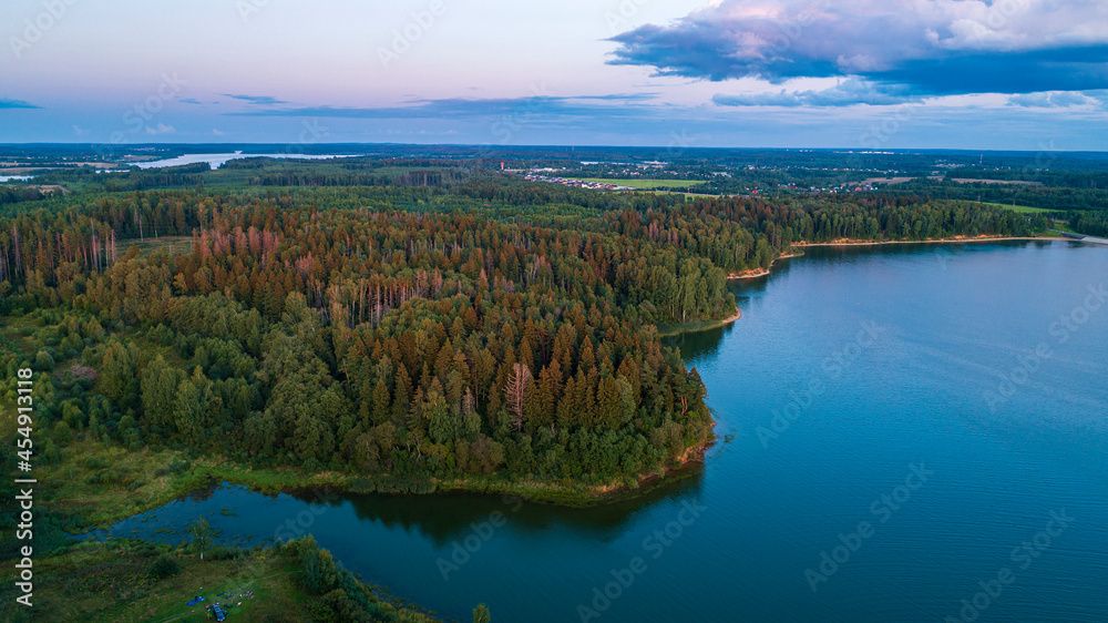 Wonderful sunset over Vodokhranilishche on Ruza river, Moscow Oblast, Russia Aerial or drone view