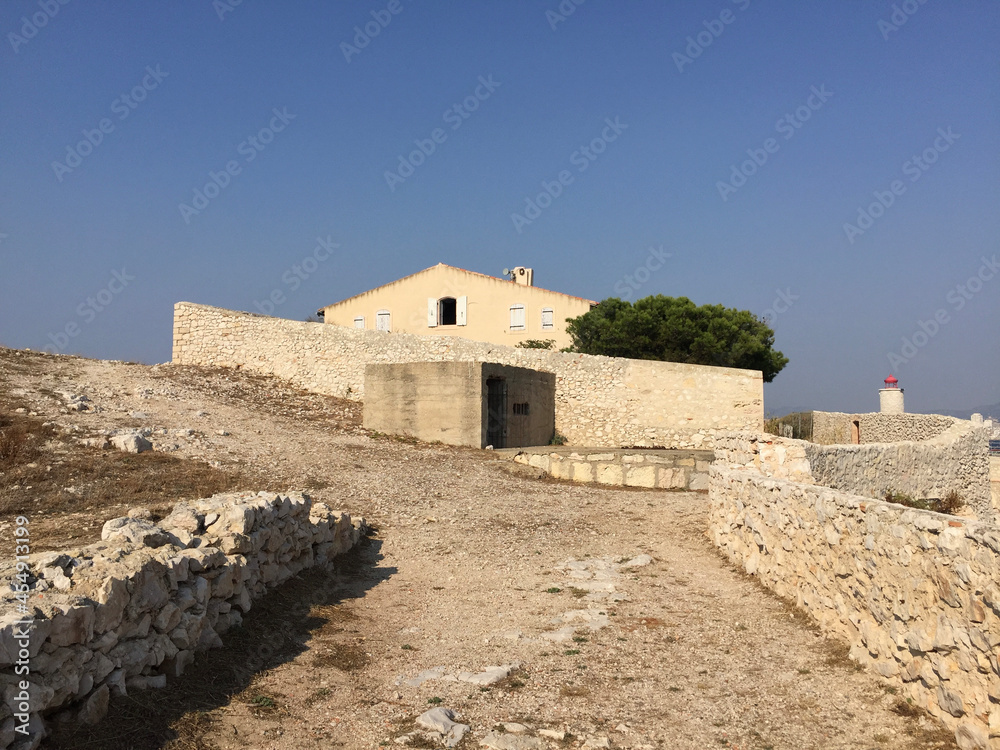 The barracks at Château d'If, a fortress and former prison located on the Île d'If, the smallest island in the Frioul archipelago, situated 1.5 km offshore from Marseille in southeastern France.