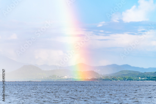 A rainbow over the sea after rain