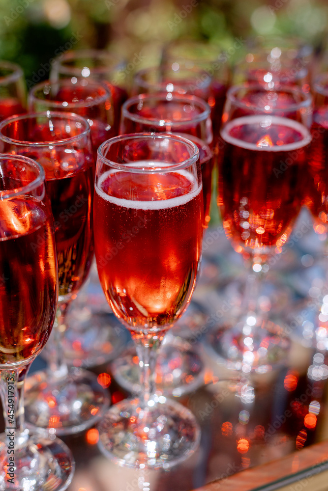 Drinks for guests Alcohol in glasses at the wedding Party of the bride and groom Drinks for guests Alcohol in glasses at the wedding Party of the bride and groom