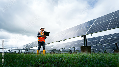 The solar farm(solar panel) with engineers check the operation of the system, Alternative energy to conserve the world's energy, Photovoltaic module idea for clean energy production