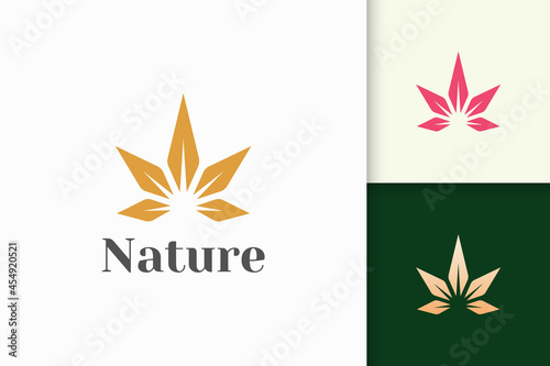 Health or beauty logo in simple flower shape fit for cosmetic product