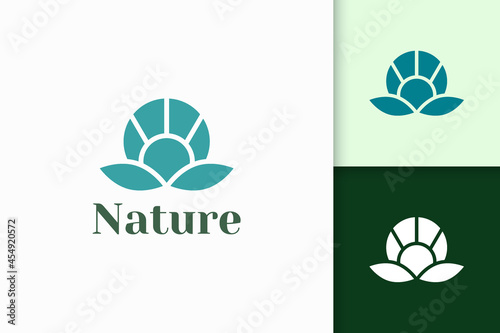 Flower logo in abstract shape for health and beauty