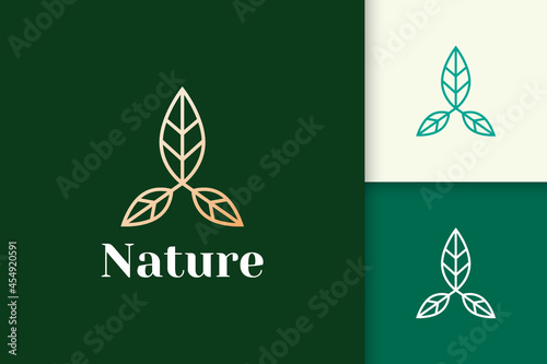 Flower logo in feminine and luxury line shape for health and beauty