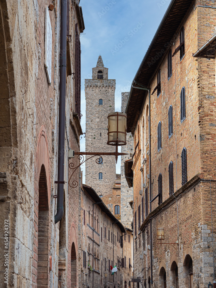 Details of Bell Towers and Brick Houses in San Gimignano in Tuscany, Siena - Italy