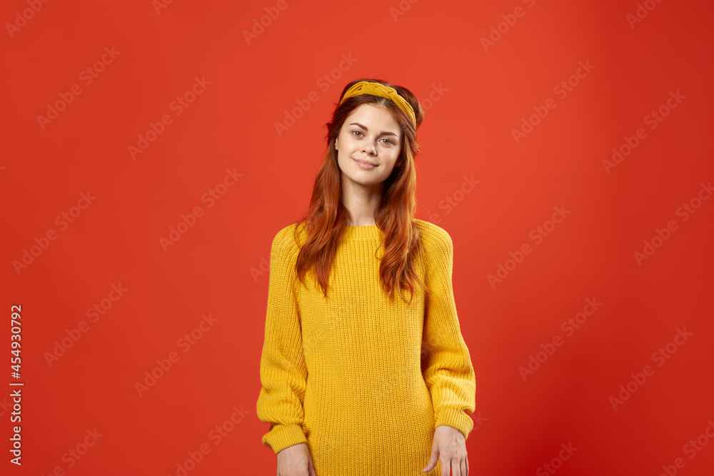 woman in yellow sweater studio street style retro decoration
