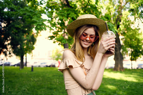 beautiful woman in a hat in the park drink rest Lifestyle