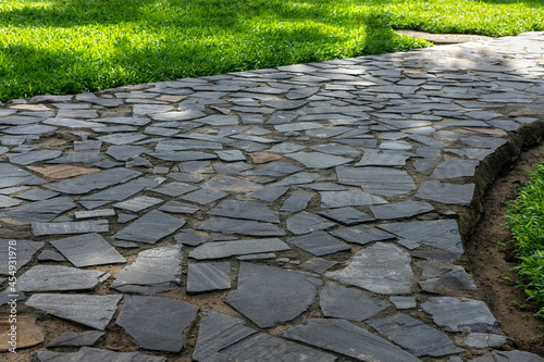 Wallpaper Mural Garden footpath made of grey pavestone Torontodigital.ca