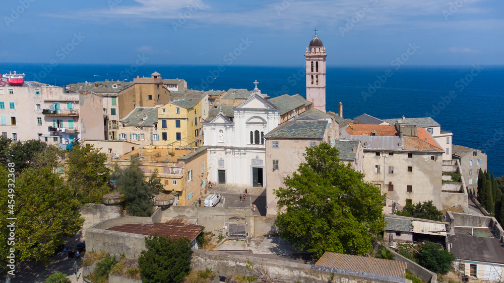 Aerial view of the Citadel of Bastia in the north of Corsica island - Pink bell tower of the Cathedral of Saint Mary of the Assumption over the Mediterranean Sea