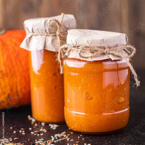pumpkin jam sweet dessert autumn harvesting canned food fresh portion ready to eat meal snack on the table copy space food background rustic. top view keto or paleo diet veggie vegan or vegetarian  