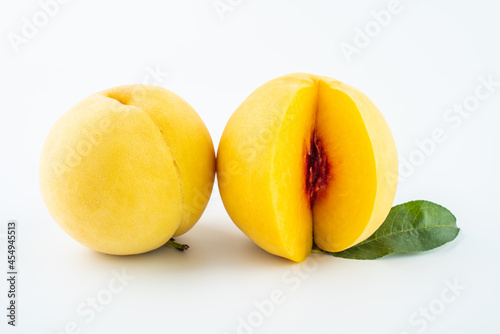 Red heart yellow peach cut on white background