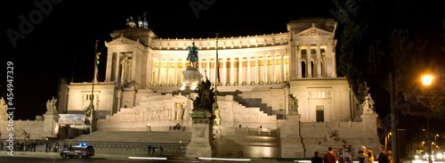 Piazza Venezia in the center of Rome at night.