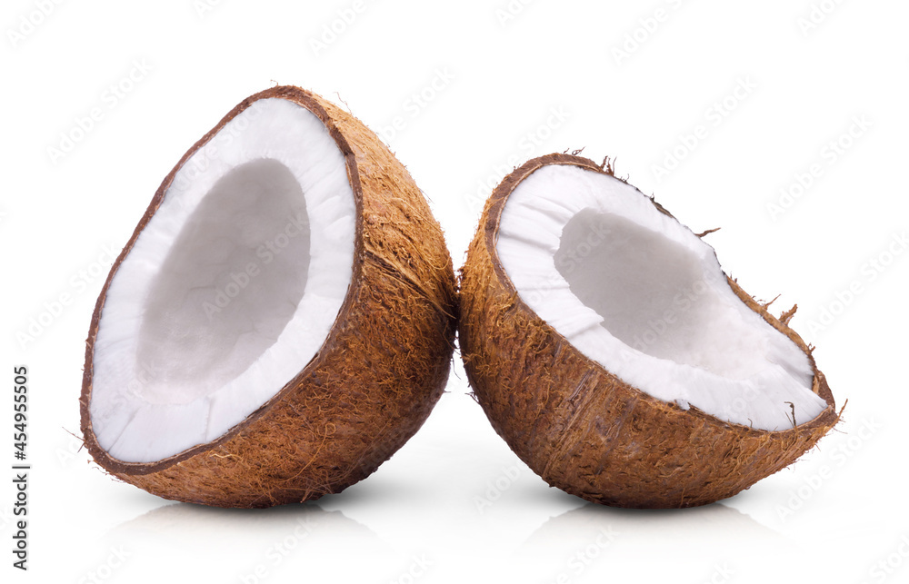 Two halves of ripe sweet coconut isolated on white background. Two halves of ripe sweet coconut isolated on white background.