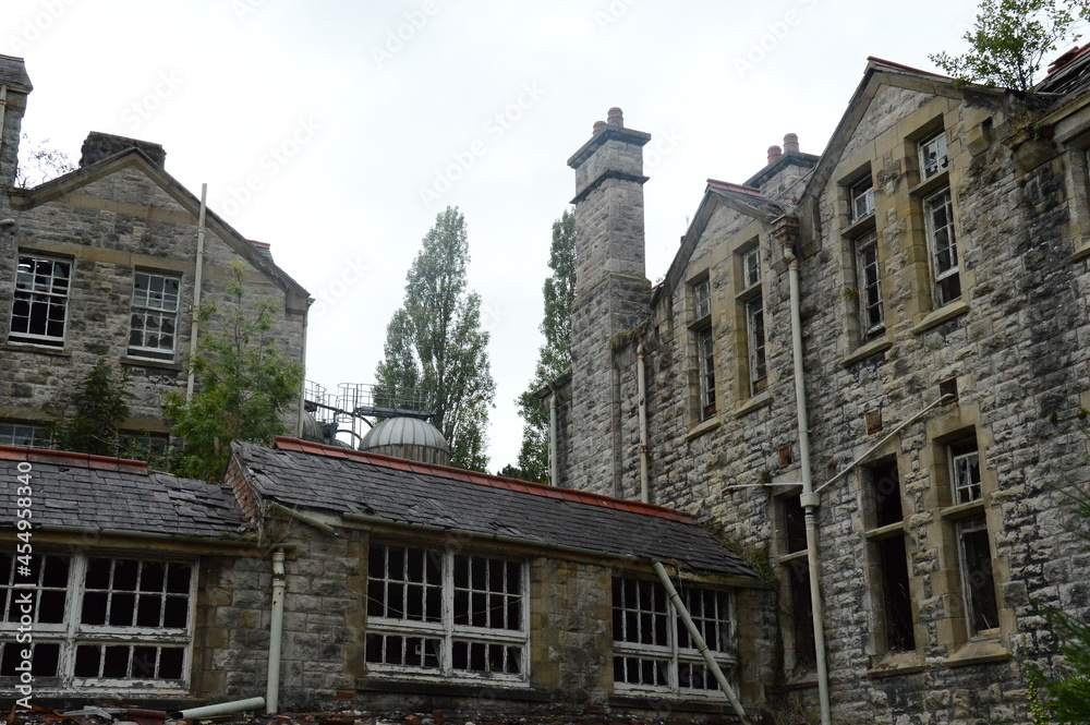 the outside of an abandoned asylum in wales