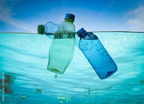 Concept of pollution,Plastic water bottles pollution in ocean photo