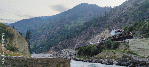 beautiful swat valley Pakistan mountains with green trees and grass water stream,natural landscape photo