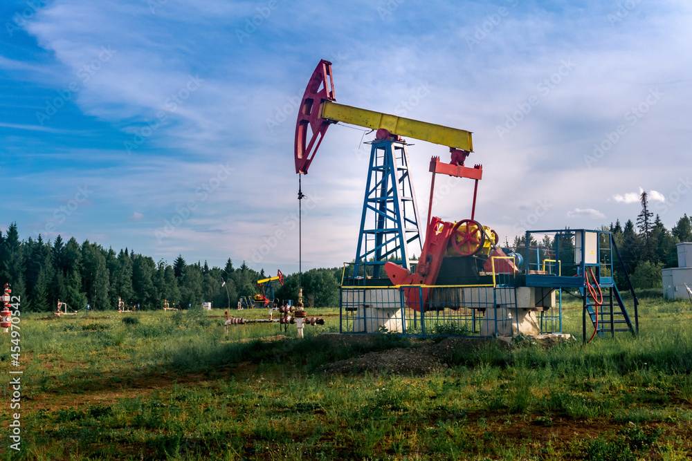 oil pumping stations in a clearing in the forest oil pumping stations in a clearing in the forest