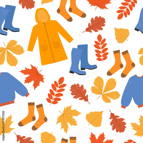 Autumn seamless pattern. Raincoat, sweater, rubber boots, socks and falling leaves on white background.