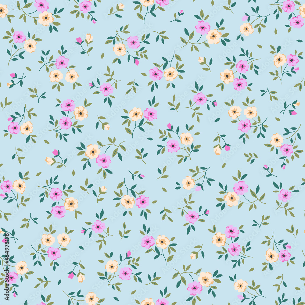 Spring flowers print. Vector seamless floral pattern. Plant design for fashion prints. Endless print made of small pastel color  flowers. Elegant template. Pale blue background. Stock vector.