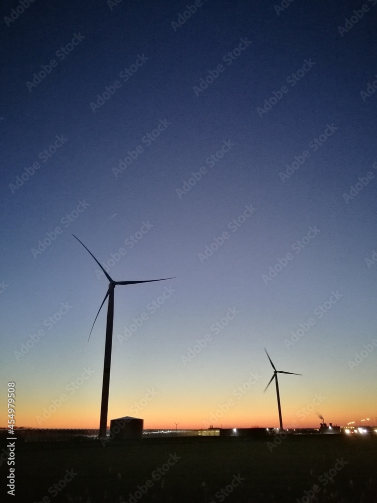 Windmills and sunset
