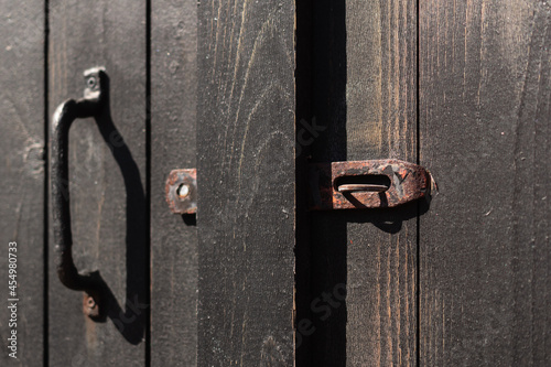 A closeup shot of old wooden barndoor photo