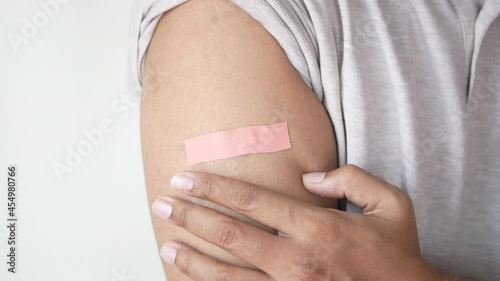 Wallpaper Mural adhesive bandage on young man's arm  Torontodigital.ca
